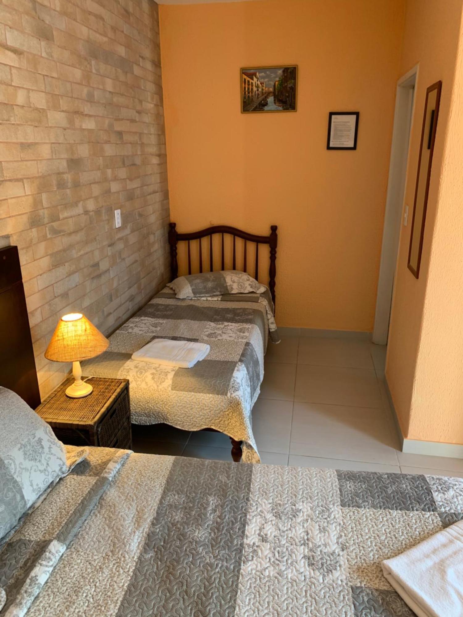 Villa Di Verona Charm Hotel Guaruja Ruang foto